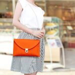 GEARONIC Clutch Purses, PU Leather Evening Envelope Clutch Handbags Womens Crossbody Bag with Chain Strap Orange