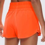CRZ YOGA Athletic Shorts for Women High Waisted Flowy Ruffle Skirt Overlay for Workout Running Tennis with Zip Pocket Neon Orange Large